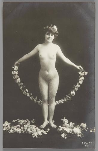 [Standing woman with flower garland]
