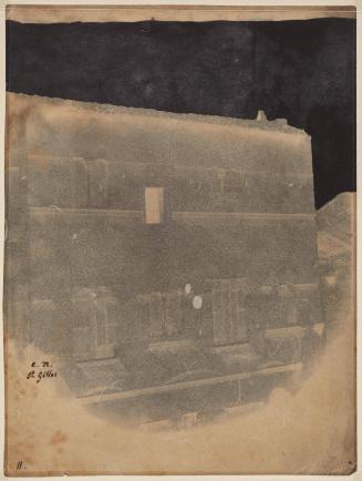 Upper part of the façade of a Roman-esque house in Saint-Gilles du Gard.