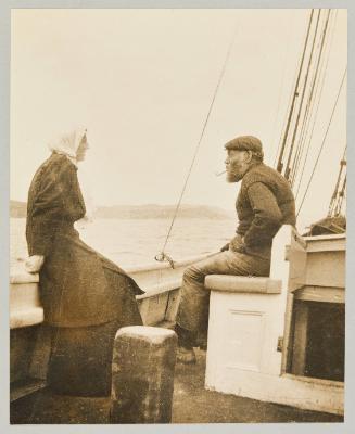 Tom + "Love-y", Nippers Harbor, Nfld. En route to Shoe Cove from Nippers Harbor. Photograph from Newfoundland Album, Collection of Canadian albums compiled by Edith S. Watson
