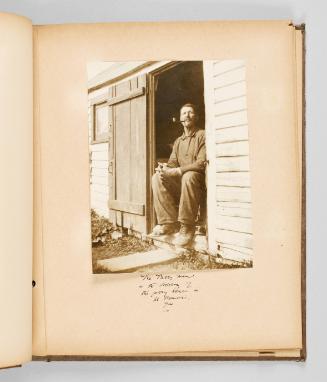 The ferry man in the doorway of the ferry house in St. Francois, Que. Page 25 of The Abenaki; from collection of Canadian albums compiled by Edith S. Watson, 1890s-1930s [a record for the blank page before this record should be added]