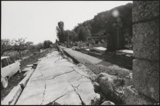 The Osopo cemetery wall fallen in the destruction caused by the Friuli earthquake, 1976