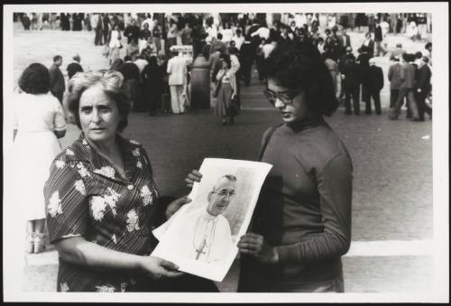 Two women in St. Peter's Square hold a photograph of recently deceased Pope John Paul I