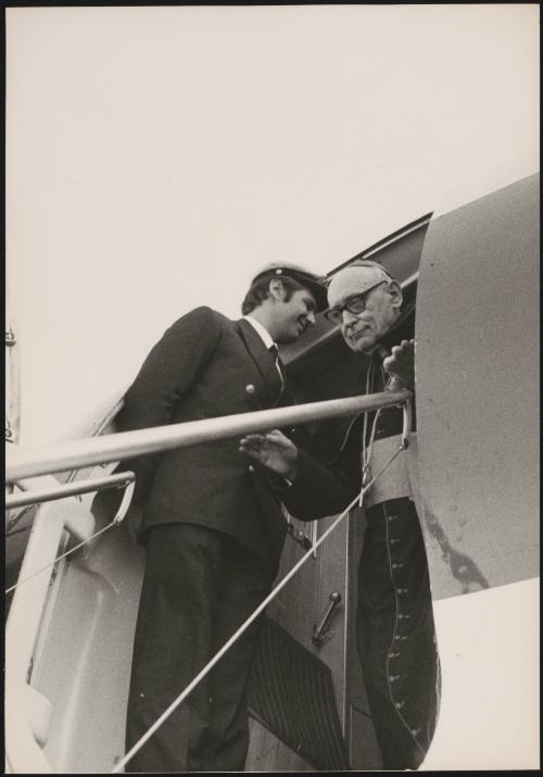 Archbishop Mindszenty stepping out of an airplane