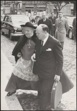 Christian Democratic Party members, including Aldo Moro escorting blind Cardinal Alfredo Ottaviani