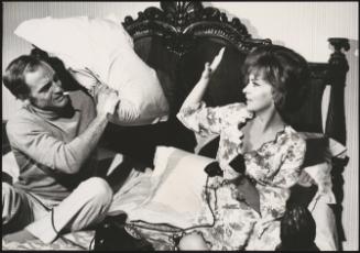 Film still of Gina Lollobrigida in a pillow fight