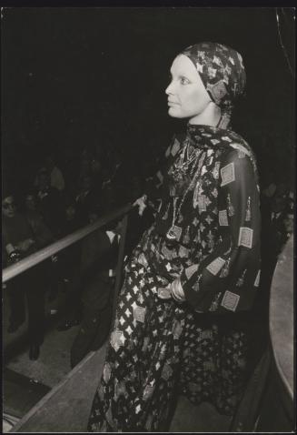 Singer Patty Pravo dressed entirely in patterned  scarves, gets ready to perform on stage 