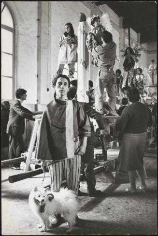 Young people in costume preparing a float for a religious procession