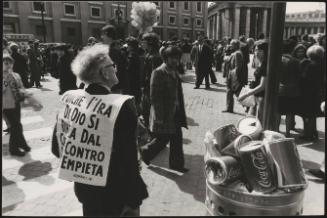 A man wearing a placard denouncing religion 