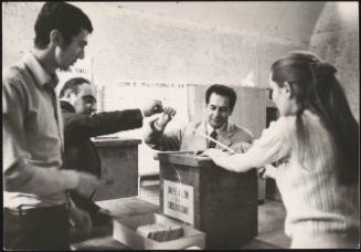Securing the ballot box at a polling station on election day