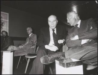 Giovanni Agnelli and Guido Carli; Antonio Giolitti is seen sitting a few chairs down from them