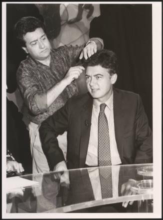Claudio Martelli gets his hair combed before a televsion appearance on a political programme