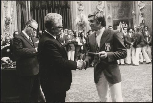 Giovanni Leone presents the Olympic diver, Franco Giorgio Cagnotto with a medal 