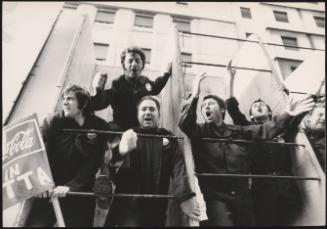 Workers from a Coca-Cola bottling factory  protesting and chanting