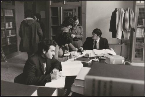 Students studying in a university library