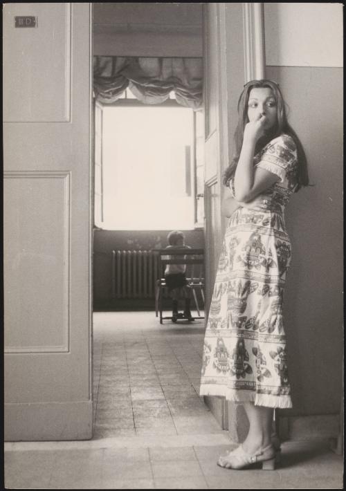 A student waits to walk into the examination room during high school final exams at the Liceo Classico Mamiani, Rome