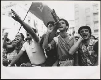 Communist protesters shouting at an Anti Mafia demonstration 