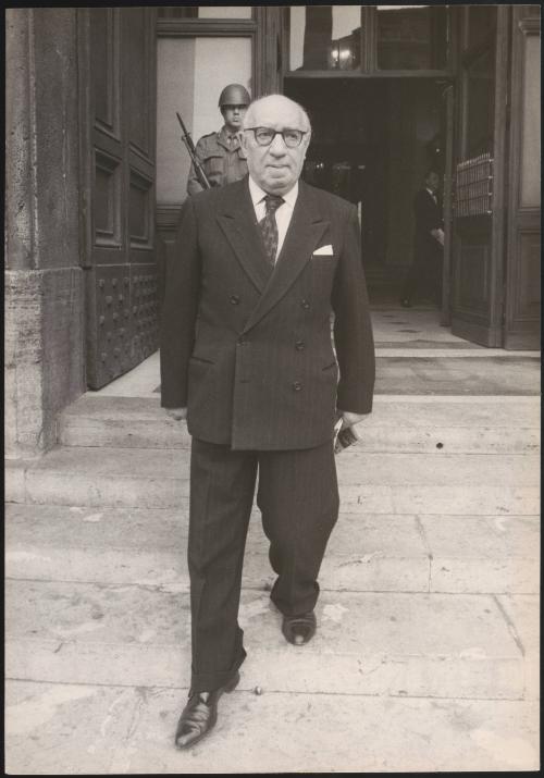 Mauro Scoccimarro leaves a building