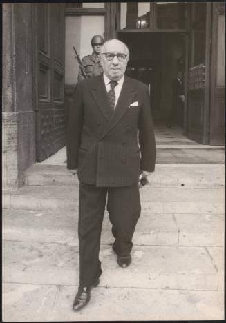 Mauro Scoccimarro leaves a building