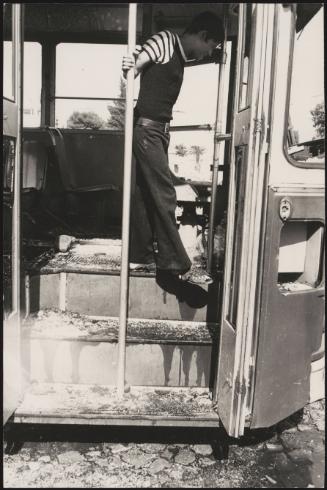 A burnt out bus, Naples