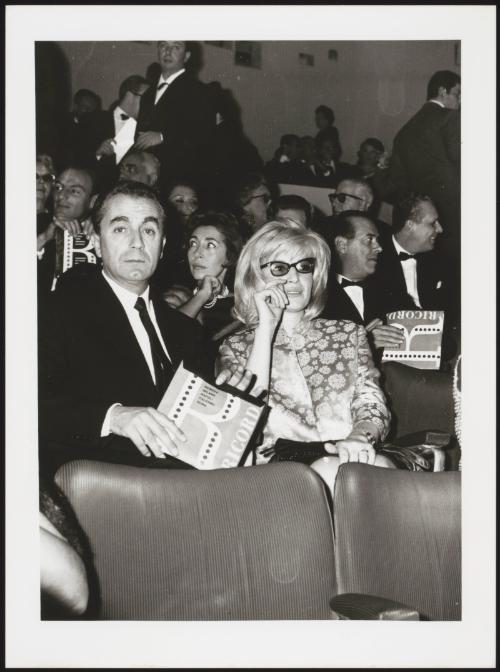 Michelangelo Antonioni with Monica Vitti together at a 'Ricordi' event in 1962