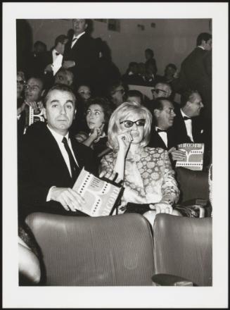 Michelangelo Antonioni with Monica Vitti together at a 'Ricordi' event in 1962