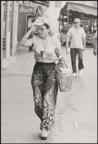 Portrait of a woman in fashionable clothing 