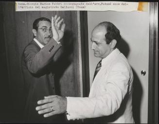 Portrait of Georgio Marino Fabbri accompanied by his lawyer