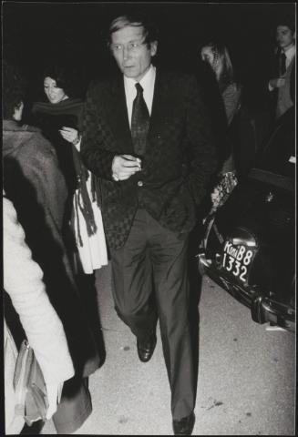 Yevgeny Yevtushenko arriving at a party