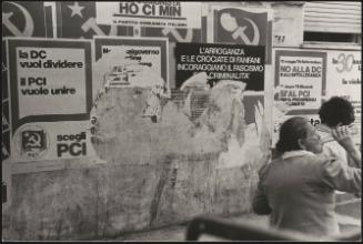 A wall of posters for the Italian Communist Party bear anti-Christian-Democratic-Party messages