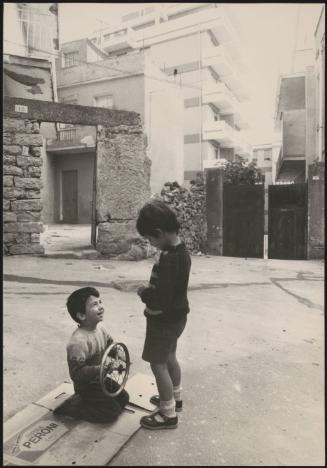 Making a box race car, Nuoro, Sardinia