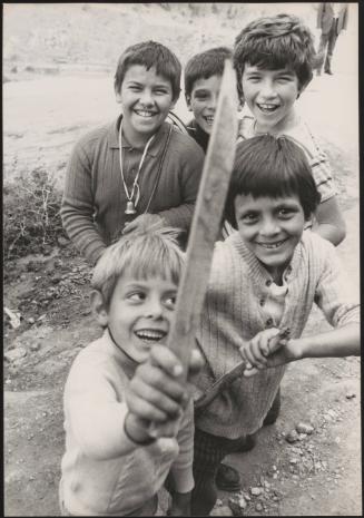 Five young boys play in Nuoro, Italy