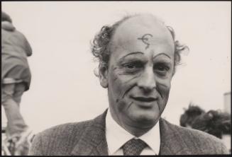 Portrait of Niccolo d'Ardia Caracciolo. His face painted with the hammer and sickle symbol