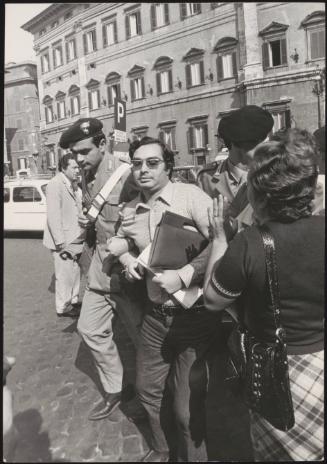 Police with protester