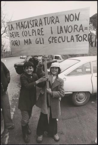 Two boys at a worker's protest 
