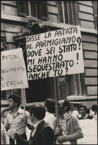 Placards raised at a food producer's demonstration