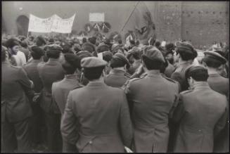 A communist flag at a military rally
