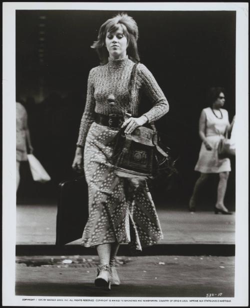 Jane Fonda crossing the street during the filming of 'Klute' in New York City