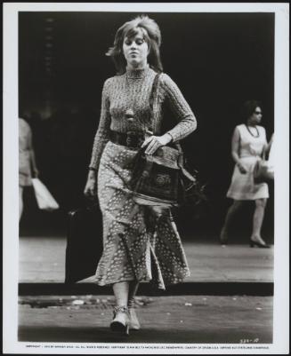 Jane Fonda crossing the street during the filming of 'Klute' in New York City