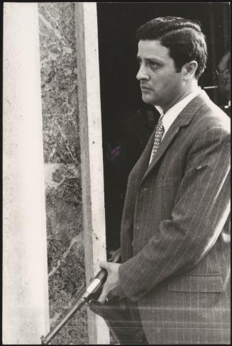 Italian police detective with machine gun