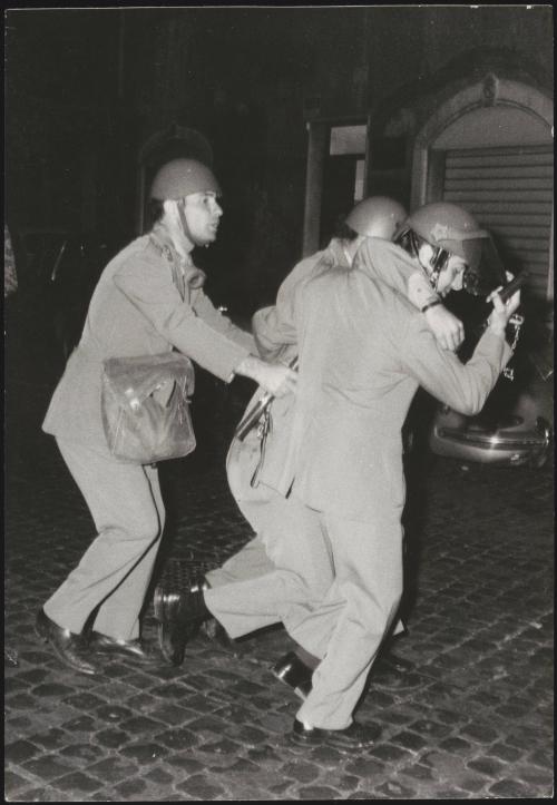 Riot police at night