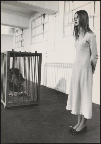 Portrait of a model and a lion during a performance art piece based on the Zodiac