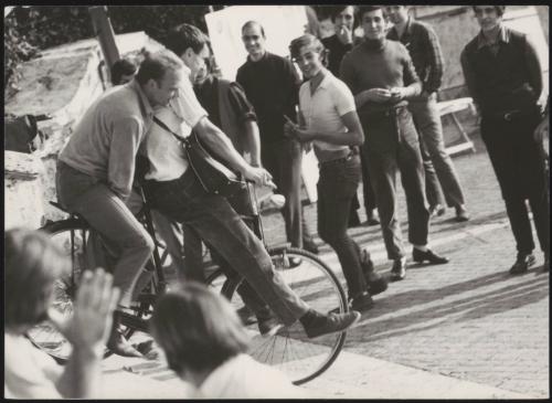 Italian 'Pappagalli' boys ride a bicycle tandem down steps in Rome