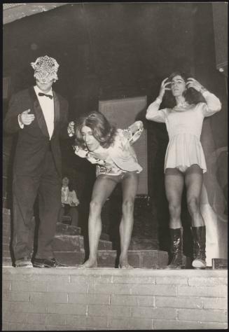 At the carnival in fancy dress and drag