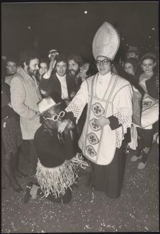 Carnival-goers in fancy dress