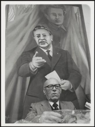 A PCI member speaks at a meeting in the Tor de Schiavi district, Rome