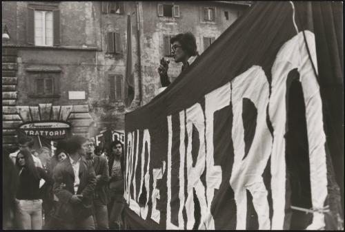 Achille Lollo leads a demonstration 