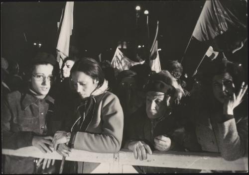 People waiting, pressed up against barriers, for the announcement of election results