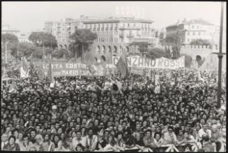 At a communist's demonstration in Naples, protesters hold banners allude to the murdered Lotta Continua member Mario Lupo