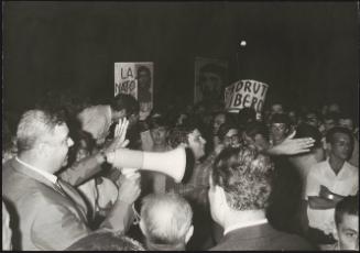 A demonstration held by young Communists with placard referencing imprisoned Padrut Franco and counterculture symbol Che Guevara