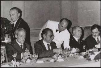 Gustavo Selva at a formal dinner